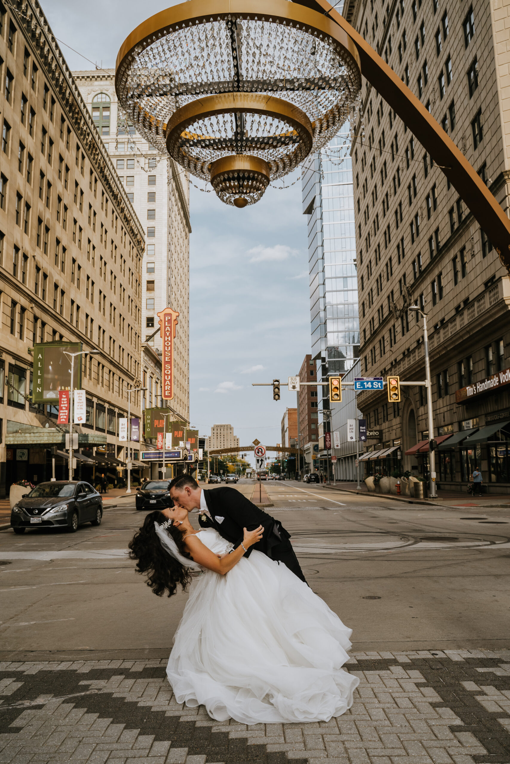Groom dips bride at Playhouse Square